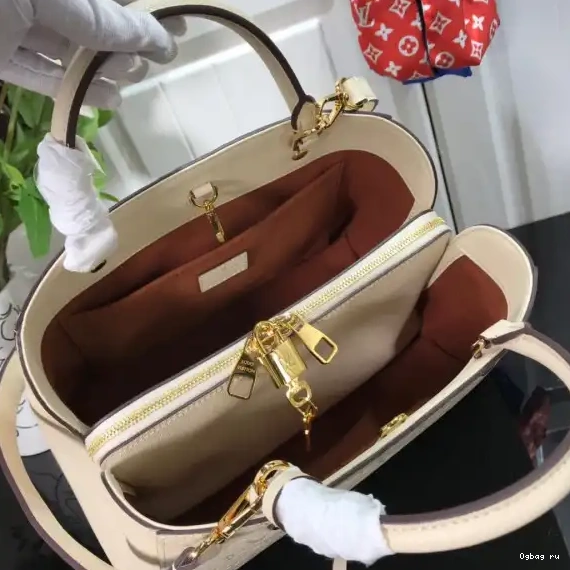 MM MONTAIGNE LOUIS VUITTON 0624